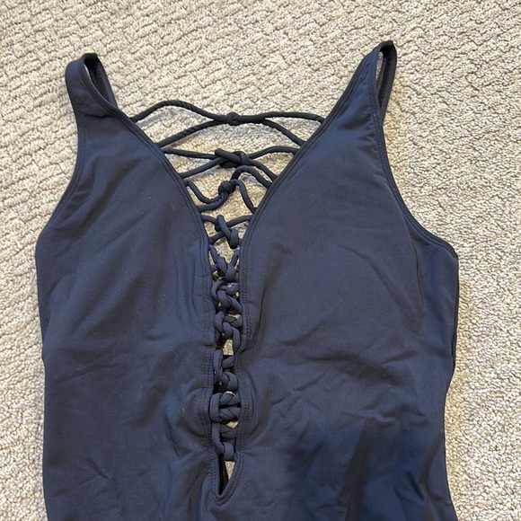 Ladies, black one piece, crisscross front and back. Gold adjustable brackets. - Picture 2 of 3